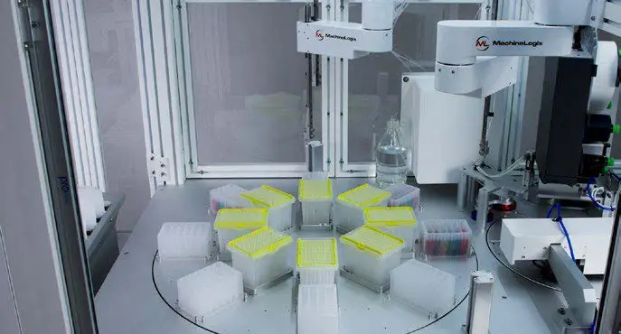 FX Machine carousel loading petrifilm plates during an automated inoculation run